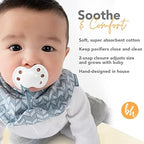 Infant wearing BooginHead adjustable snap closure bib