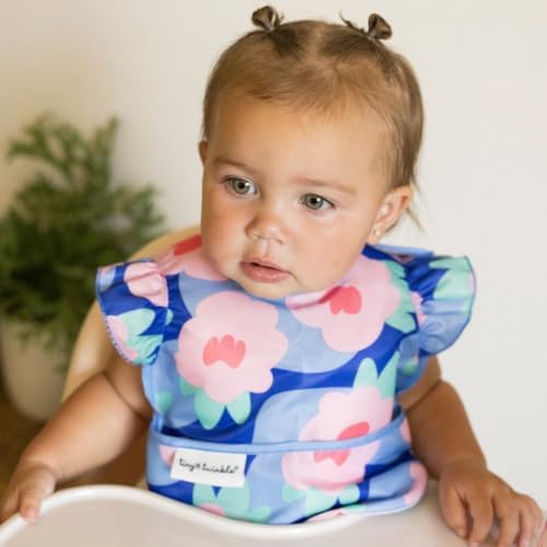Close up view of the soft non scratch hook and loop closure on the Tiny Twinkle baby apron.