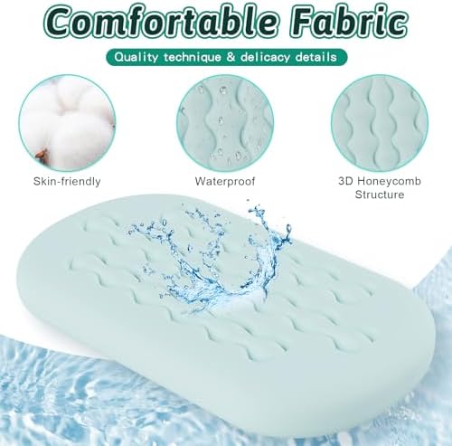 Waterproof cotton mattress protector fitted onto an oval kids travel bed.