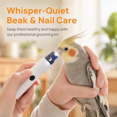 Ergonomic lightweight bird grooming device demonstrating the single button operation switch