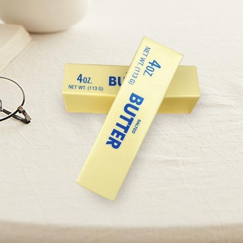 Cuteam butter squishy toy being squeezed by a hand to demonstrate the ultra soft slow rebound foam material