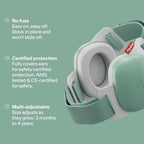 Baby wearing green Alpine Muffy earmuffs for noise protection