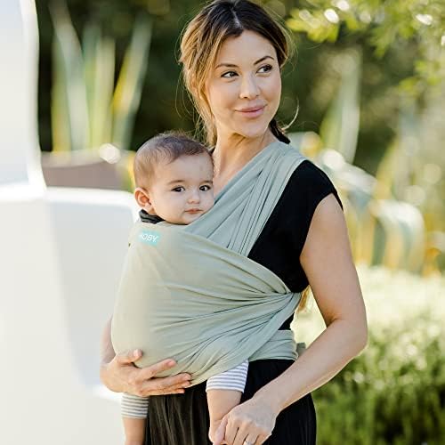 Ergonomic baby carrier wrap demonstrating even weight distribution across the shoulders and back