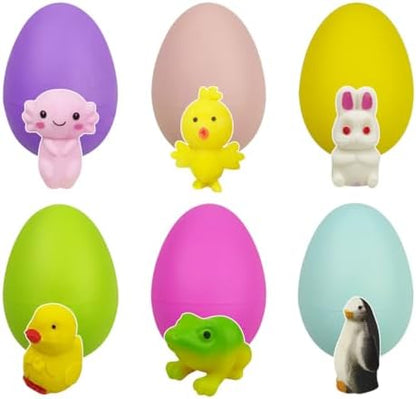 Six colorful surprise animal eggs lined up before immersion in water