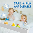 Foldable gray silicone play pad and tray organizing bath toys on a tub ledge.