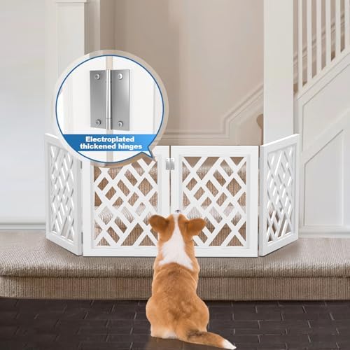 Low height freestanding dog fence placed at the base of indoor stairs