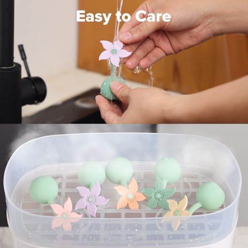Haakaa flower stopper inserted into a silicone manual pump neck