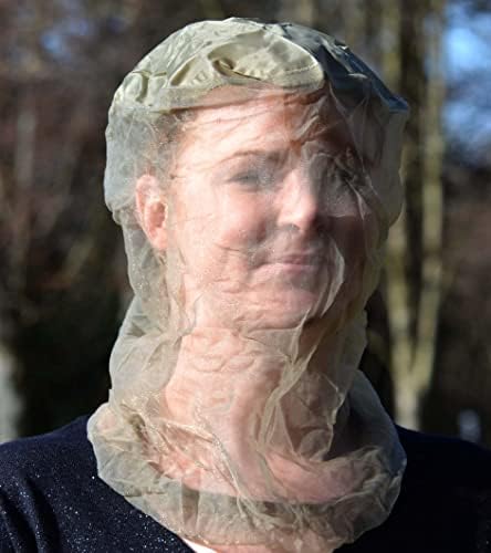 Smidge lightweight head net worn over a hat for outdoor insect protection.