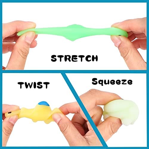 Open colorful plastic easter eggs with dinosaur toys inside