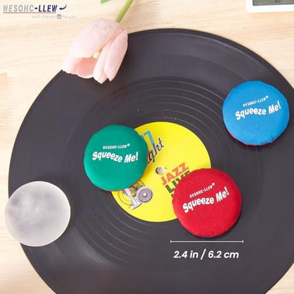A lifestyle shot highlighting the compact size of the fabric covered adult fidget pad.