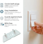 Close up of childproof electrical socket guard in white