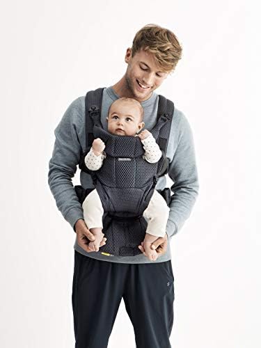 BabyBjorn Carrier Free showing adjustable safety buckles and straps