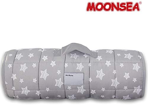 Child using Moonsea nap mat on standard daycare cot