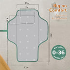 Phoebus Baby foldable diaper mat being opened with one hand featuring the storage organizer pockets