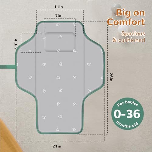 Phoebus Baby foldable diaper mat being opened with one hand featuring the storage organizer pockets