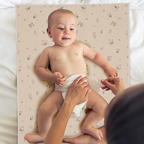Floral print detail on Phoebus Baby changing mat