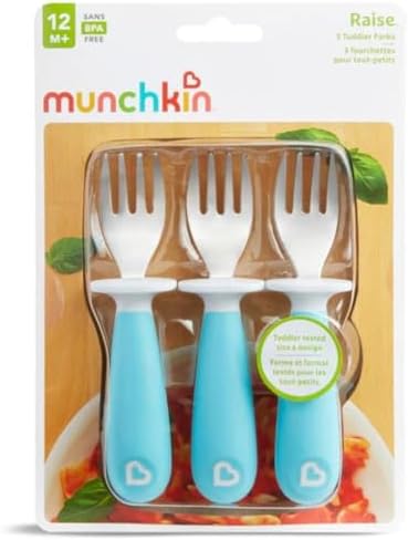 Toddler using ergonomic Munchkin stainless steel fork