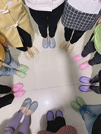 Mixed multi-color Uilb guest slippers in a row
