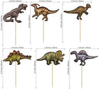 Close up of glitter cardstock dinosaur party cake decorations