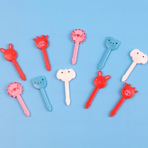 Cute cartoon animal fruit toothpicks arranged inside a toddler lunch box