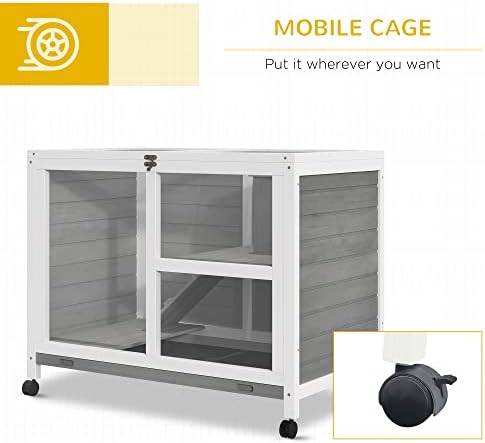 Indoor rabbit hutch positioned next to furniture showcasing compact size