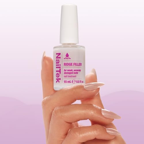 Nail Tek ridge filling base coat application brush showing the smoothing formula texture