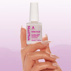 Nail Tek ridge filling base coat application brush showing the smoothing formula texture