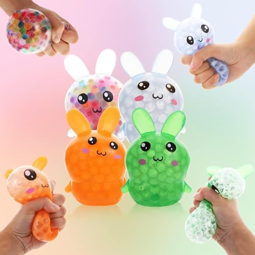 Four translucent silicone bunny squeeze toys in white blue orange and green colors.