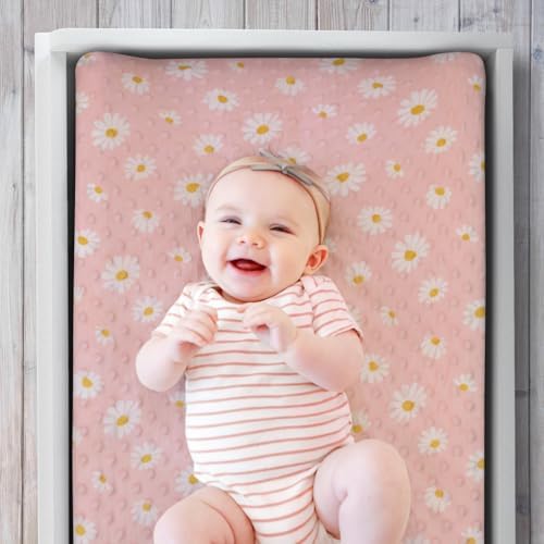 The Peanutshell minky changing table sheet folded to display texture.
