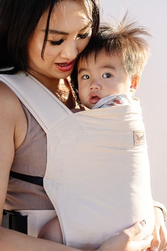 Folded Happy! Original Baby Carrier inside a diaper bag