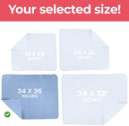 Utopia Bedding reusable bedwetting pads being folded neatly into a stack.