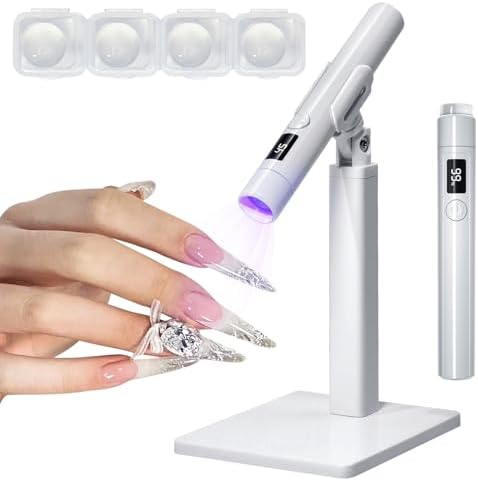 Handheld cordless UV LED nail lamp demonstrating flash curing on a finger