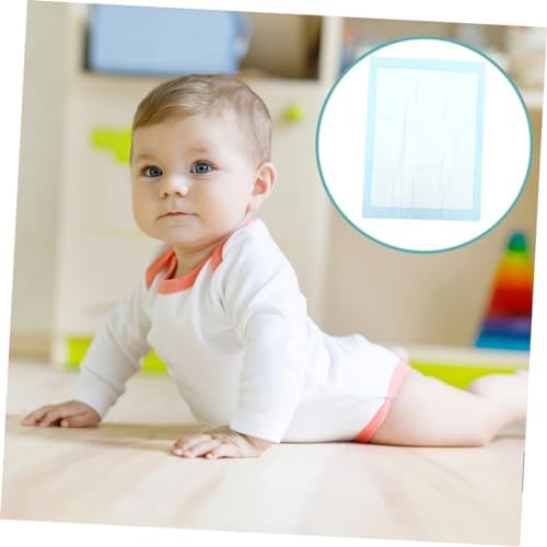 Besportble absorbent changing pad in use during diaper change