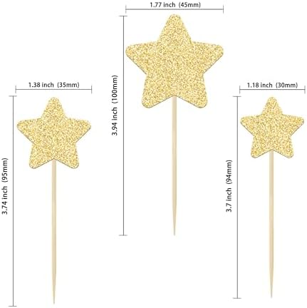 Close up of gold glitter star cake picks on decorated cupcakes