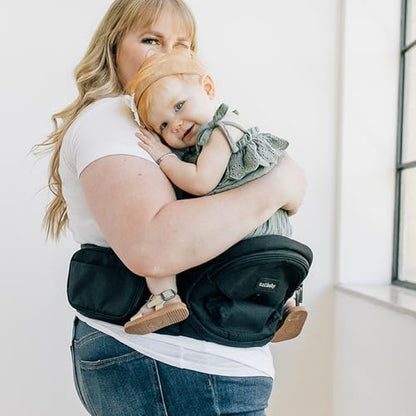 Authentic multi position compact hip seat carrier showing secure single buckle attachment.