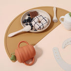 Waterproof food grade silicone feeding mat rolled up for travel convenience