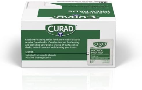 Curad alcohol prep pads being used for pre-injection cleansing.