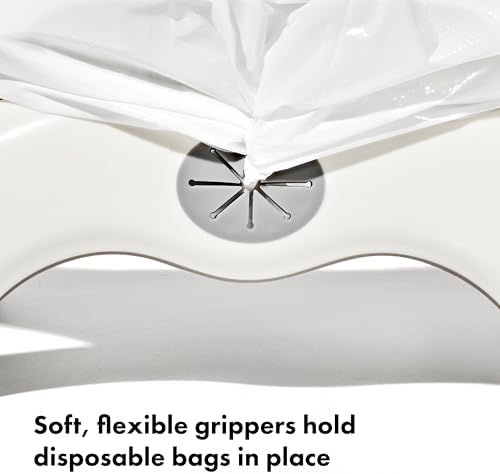 Toddler sitting on the Oxo Tot 2-in-1 portable potty
