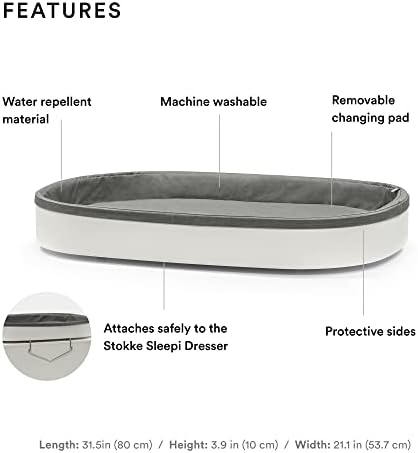 Stokke Sleepi Changer angled view showing protective sides