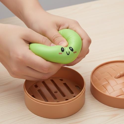 Top view of the PLGEBR pink colorful dumplings stress ball resting neatly inside its realistic miniature bamboo style storage container