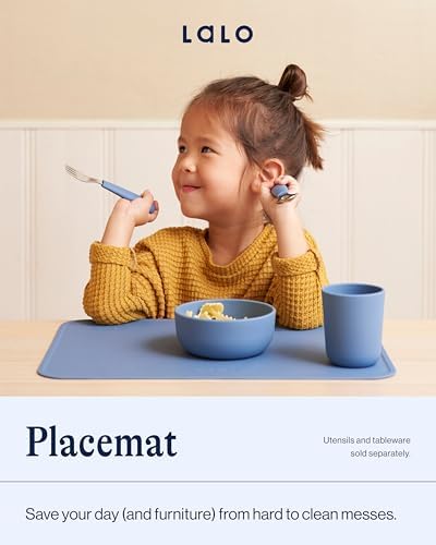 Sage green baby placemat rolled up compactly to demonstrate travel portability
