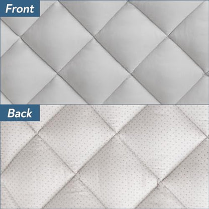Magik And Kover washable kennel pad being placed in a washing machine for easy cleaning