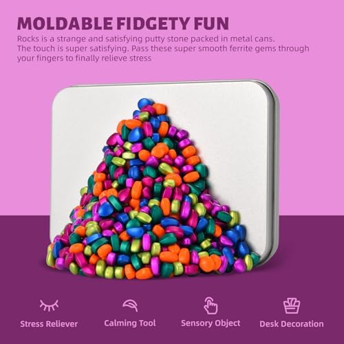Adult hands molding and sculpting multicoloured magnetic putty stones for workplace anxiety relief