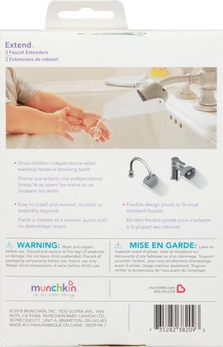 Toddler using Munchkin sink extender for hand washing