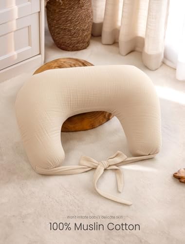 Parent using Lulumoon nursing pillow cover with baby