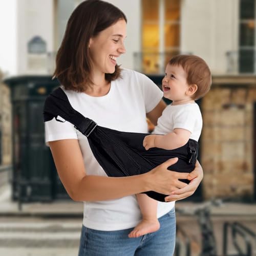 Joyncleon black baby carrier folded compactly next to a travel diaper bag.