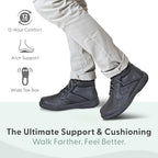 Side profile of black leather lace-up boots showing slip-resistant soles.