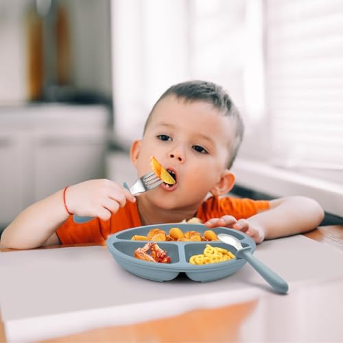 Toddler using Eascrozn stainless steel baby spoon and fork