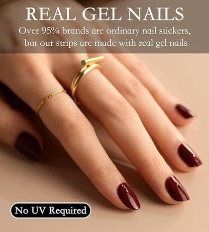 Trimming excess length of the vineyard dark red gel wrap using the included prep nail file