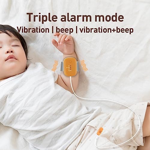 USB rechargeable potty training pee alarm with moisture sensor clip attached.